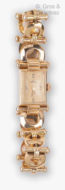 null OMEGA - Yellow gold ladies' watch, rectangular case (14 x 16 mm) with gadroons,...