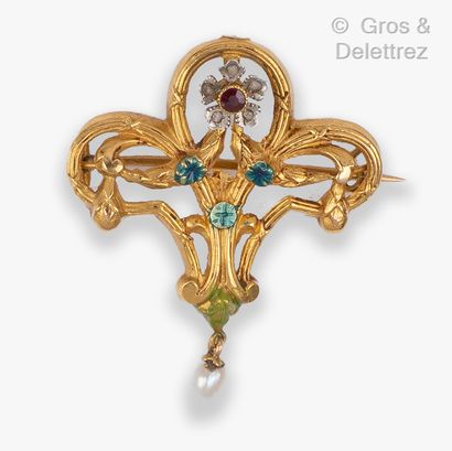 null Yellow gold enamelled brooch with flowery garlands holding a pearl in a pendant....