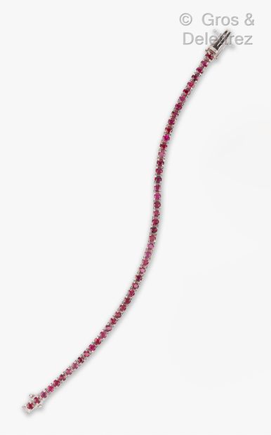 null Ligne" bracelet in white gold, entirely set with round faceted rubies. Length...