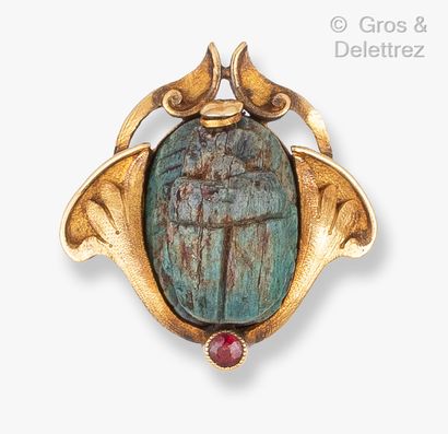 A beetle in enamelled frit engraved with...