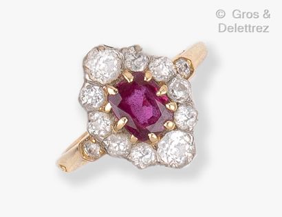  Yellow gold "Flower" ring, set with a cushion-shaped ruby in a setting of old-cut...