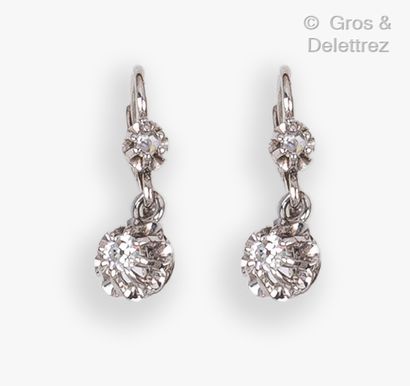 null Pair of white gold "Dormeuses" earrings, set with brilliant-cut diamonds. Length...