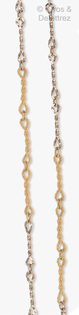 null Long necklace made of yellow gold twists, alternated with white gold twists....