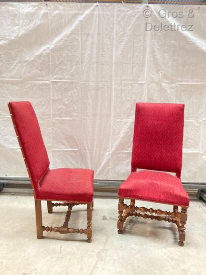 null Pair of walnut chairs, the high rectangular back, the turned legs with H-shaped...