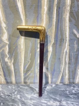 null (Study)Wooden umbrella handle with gilded brass handle with repoussé decoration...