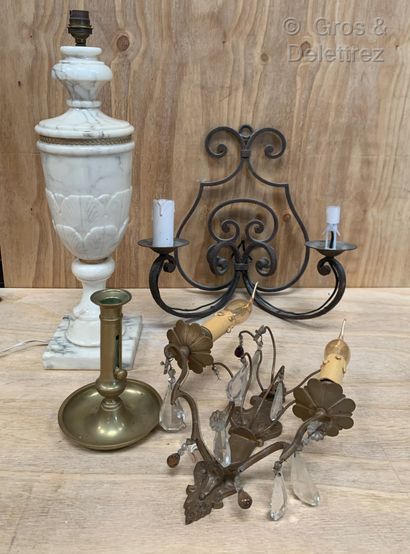 null Lot composed of a brass candlestick, a wrought iron sconce with scrolls, a sconce...