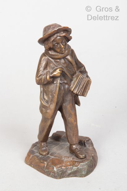 FRENCH SCHOOL 
Young accordionist 
Bronze...