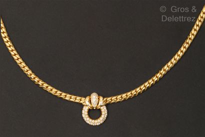 Yellow gold necklace with a mobile circular...