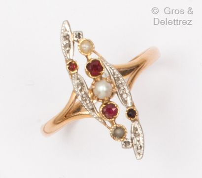 null Yellow gold "Navette" ring, set with pearls, rose-cut diamonds and garnets....