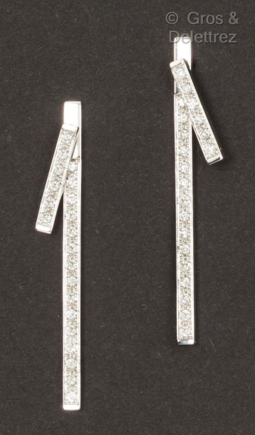 null Pair of "Lignes" earrings in white gold, composed of two lines (one removable)...