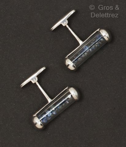 Pair of silver cufflinks, composed of glass...