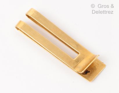 Yellow gold tie clip. P. 13,8g.