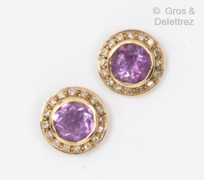 Pair of yellow gold earrings, each set with...