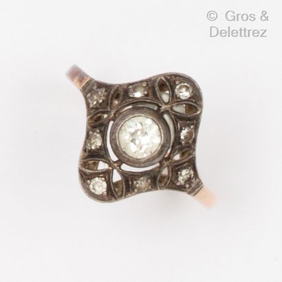  Yellow gold and silver ring with openwork foliage, set with an old-cut diamond in...