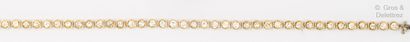 null Ligne" bracelet in yellow gold, entirely set with brilliant-cut diamonds. Length...