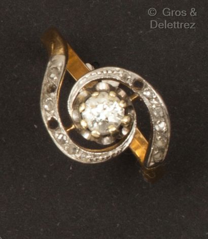 null Yellow gold and platinum "Tourbillon" ring, set with an old-cut diamond in a...