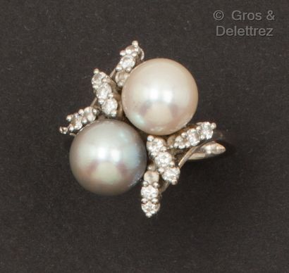 White gold ring set with a cultured pearl...