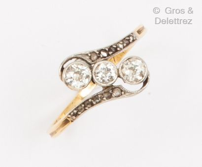 Yellow gold and platinum ring set with three...