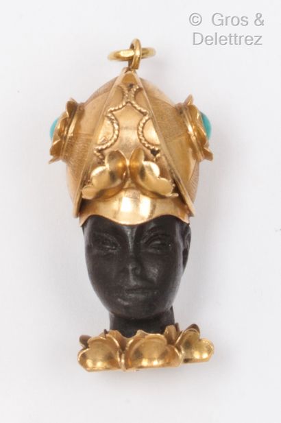 null Yellow gold and blackened wood "Moor" pendant, decorated with a warrior whose...