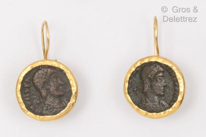 Pair of yellow gold earrings, adorned with...