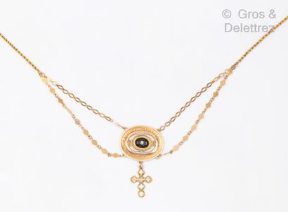 null Collier « d’Esclave » en or jaune émaillé noir à décor de fleurettes, orné d’une...