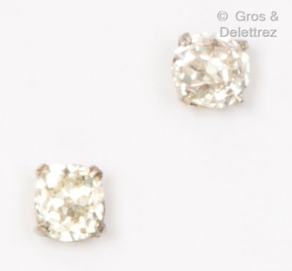null A pair of white gold earrings, each with an old cut diamond. Total weight of...