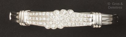 null Rhodium-plated white gold "Opening Bracelet", with central gadroons and paved...