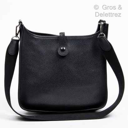HERMÈS Paris made in France 
Bag " Evelyne " 28 cm in black Togo calfskin, snap fastener...