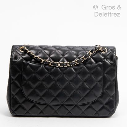 CHANEL Year 2012 
Black quilted lambskin "Jumbo" bag, gold metal "CC" clasp on double...