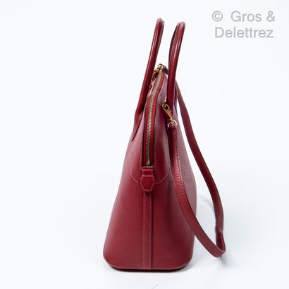 HERMÈS Paris made in France Year 2003

Bag " Bolide " 35 cm in burgundy Clemence...