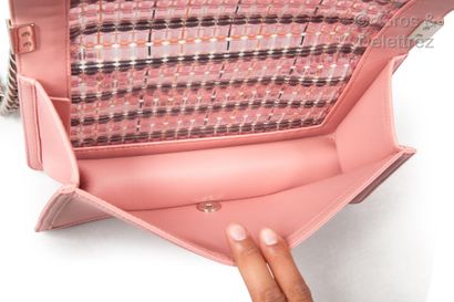 CHANEL Circa 2018

"Boy" bag in pink lambskin leather and multi-material caning in...