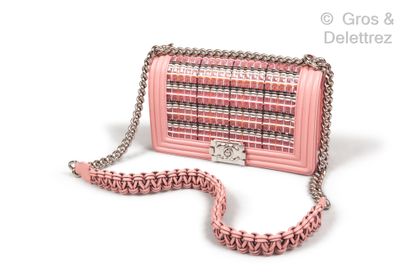 CHANEL Circa 2018

"Boy" bag in pink lambskin leather and multi-material caning in...