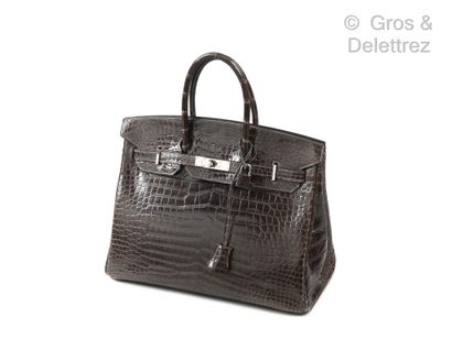 HERMÈS Paris made in France Year 2009

∆ "Birkin" bag 35 cm in graphite Crocodylus...