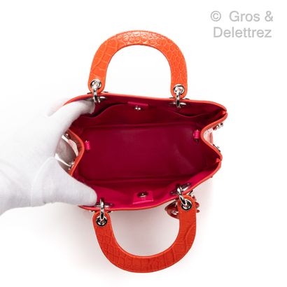 CHRISTIAN DIOR ∆ "Lady Dior" bag PM 23 cm in orange matted crocodile, pink leather...