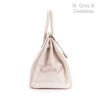 HERMÈS Paris made in France Year 2010

Birkin" bag 35 cm in dragée pink Swift, silver...