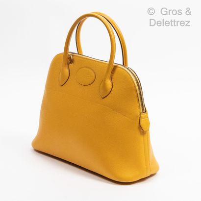 HERMÈS Paris made in France Year 1994

Bolide" bag 31 cm in chick yellow Epsom calfskin,...