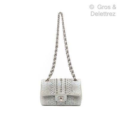 CHANEL Year 2012

"Classic" bag 20 cm in white glossy mother of pearl reticulated...