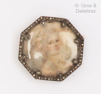 null A yellow gold hexagonal brooch with a miniature painted on mother-of-pearl representing...