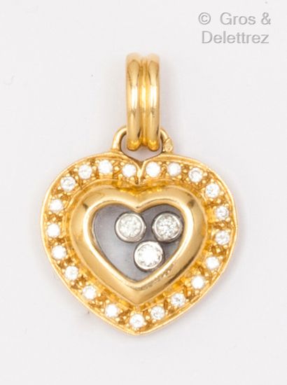 null Pendentif « Cœur » en or jaune, orné de trois diamants mobiles entre deux plaques...