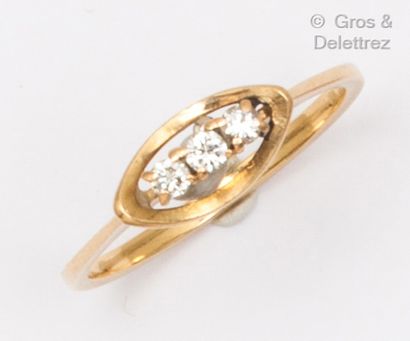 null Yellow gold "Navette" ring, set with three brilliant-cut diamonds. Finger size...