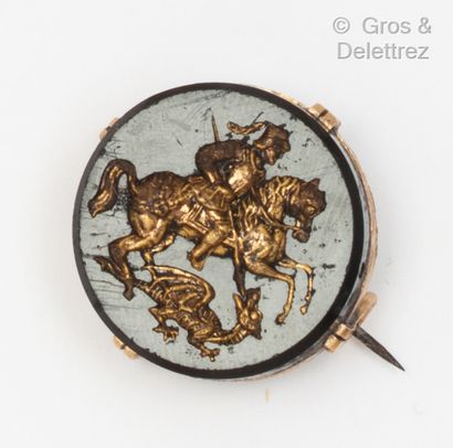 null Yellow gold brooch, decorated with a double-sided motif, one representing Saint...
