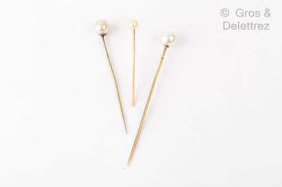 Set of three yellow gold and gilt metal tie pins, each with a cultured pearl. Gross...