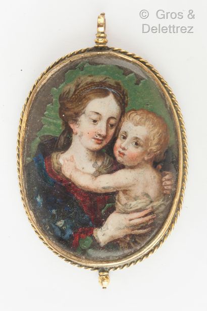 null Gilded metal medallion decorated with a painted miniature representing the Virgin...