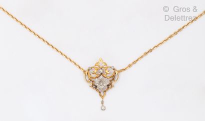 null A vermeil necklace holding a poly-lobed pendant, adorned with white stones with...