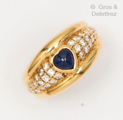 null Yellow gold "Jonc" ring set with a heart-shaped cabochon sapphire and brilliant-cut...