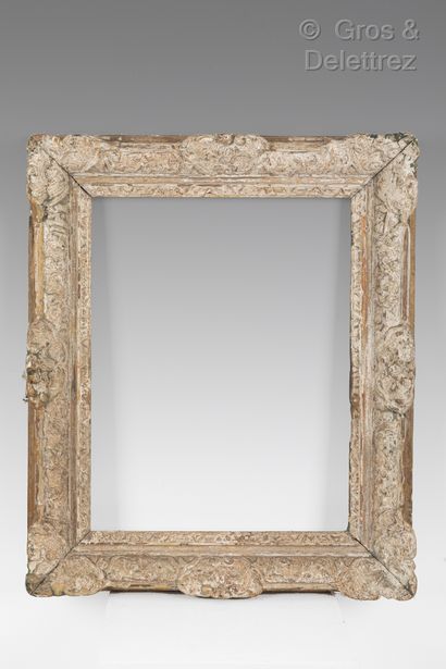 null Carved oak frame with Bérain decoration.

Louis XIV period

34 x 45 x 8,5 cm....