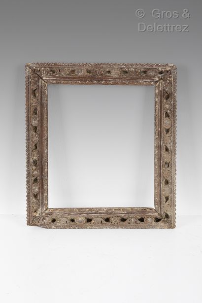 Carved and openworked wooden frame with alternating acanthus leaves and culottes....