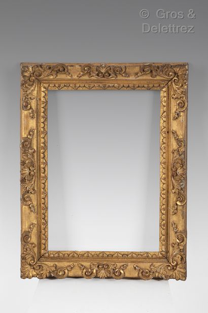 null Carved and gilded oak frame with scrolls in the corners and the middle.

Northern...