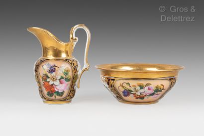 null PARIS, circa 1830

Polychrome porcelain toiletry set with flowers in cartou...