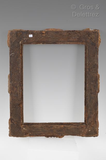  Carved and gilded wood frame with Bérain decoration with old parecloses. 
Louis...